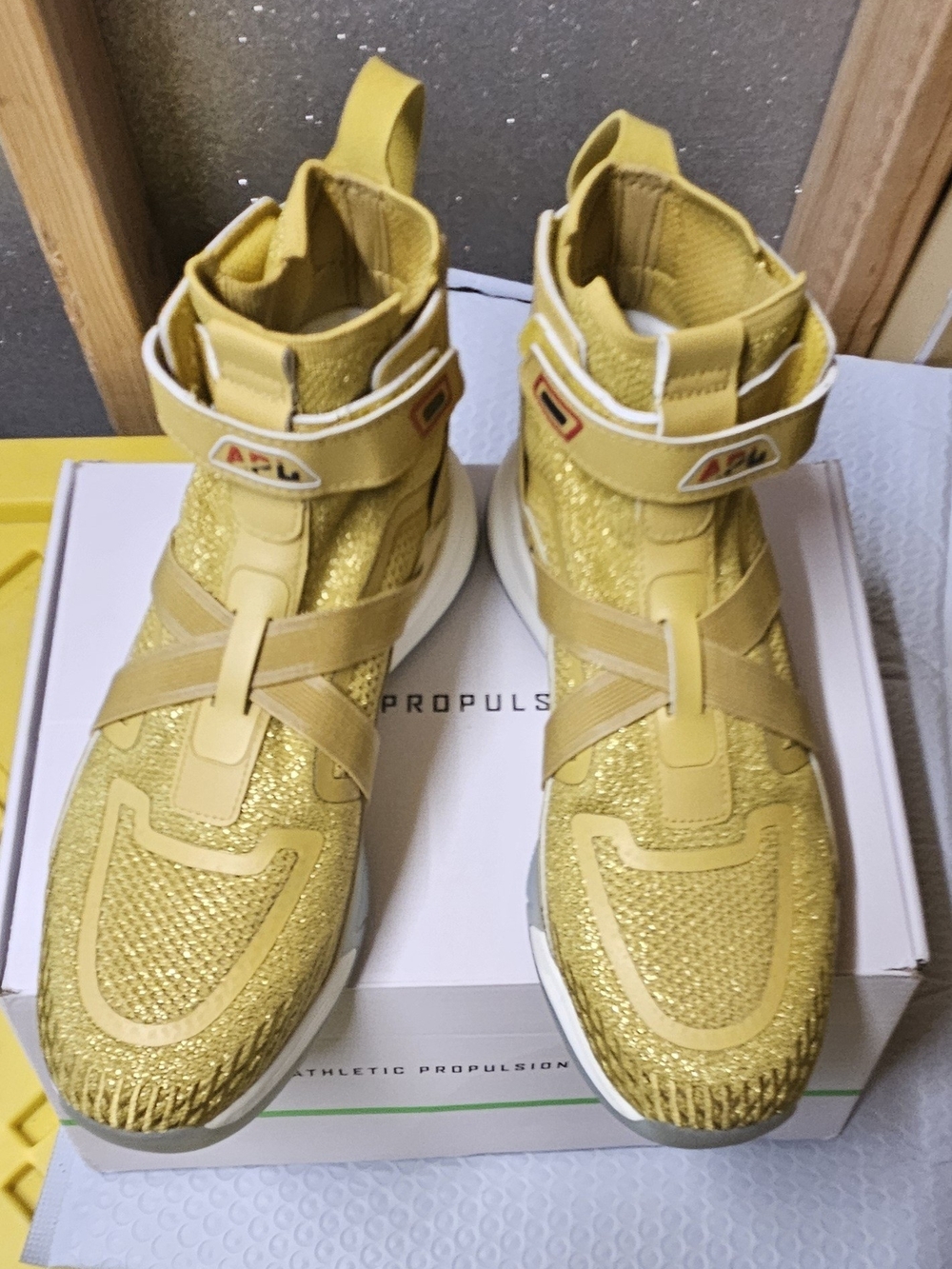 APL Gold High-Top Sneakers